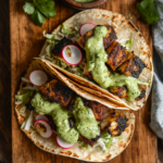 blackened fish tacos with avocado sauce